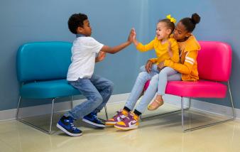 Children playing in pediatric waiting room